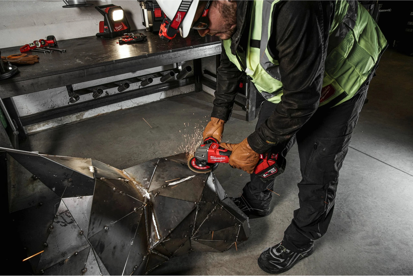 M18 125 mm angle grinder with brake and paddle switch + 2 × 5 Ah batteries + charger + Milwaukee case, M18 FSAG125XB-502X